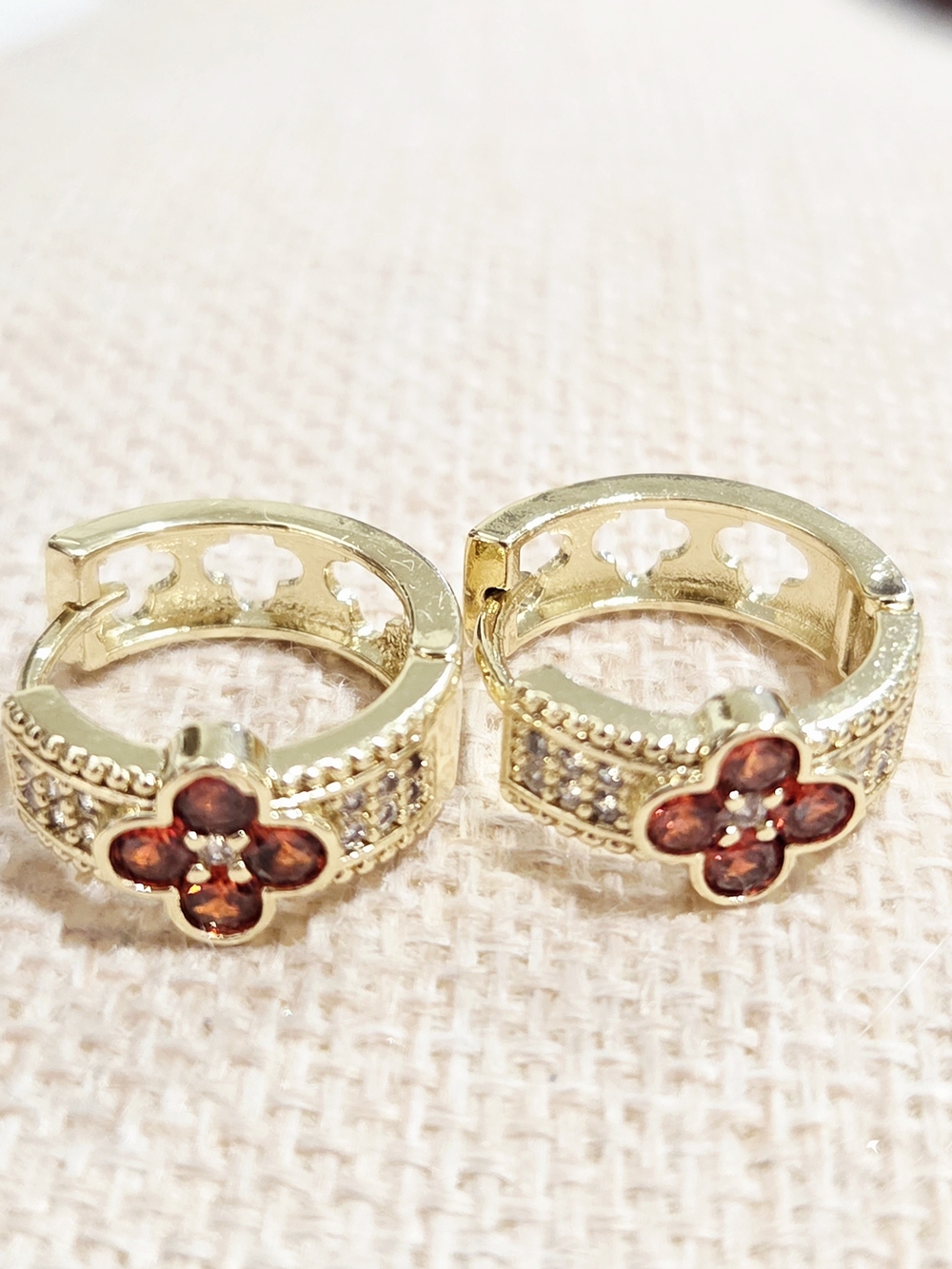 Gold Hoop Earrings with Red Flower Gem Accents